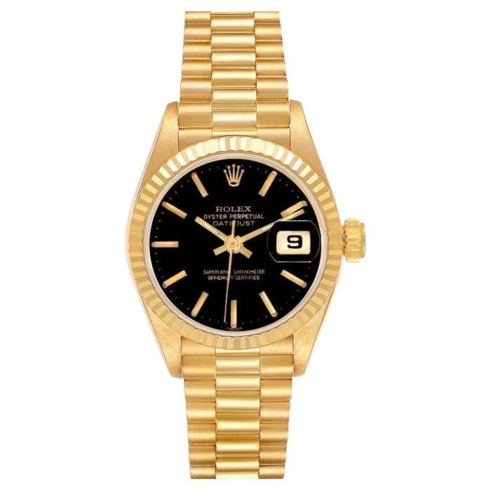 Black face gold rolex